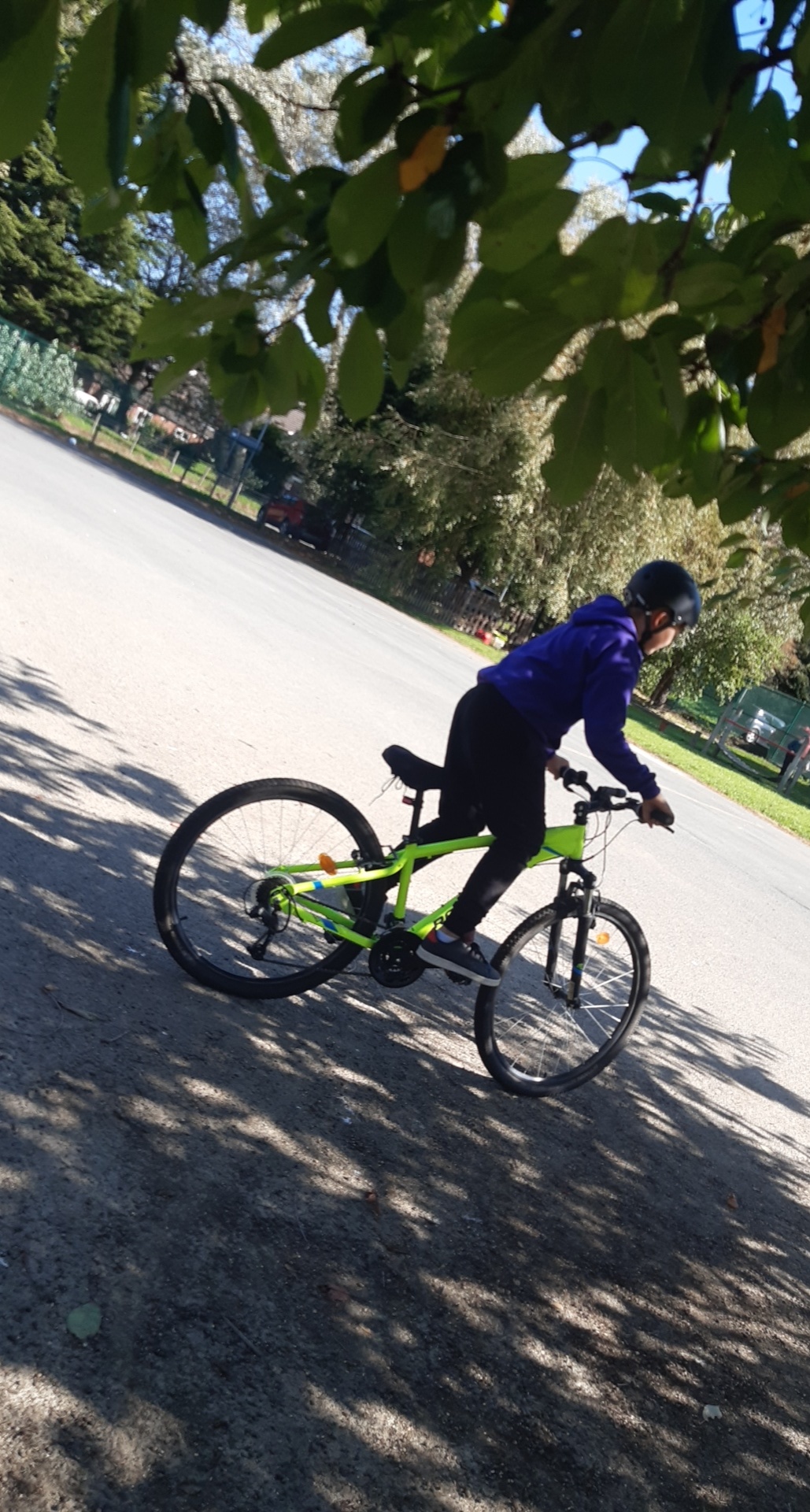 A young boy on a bike